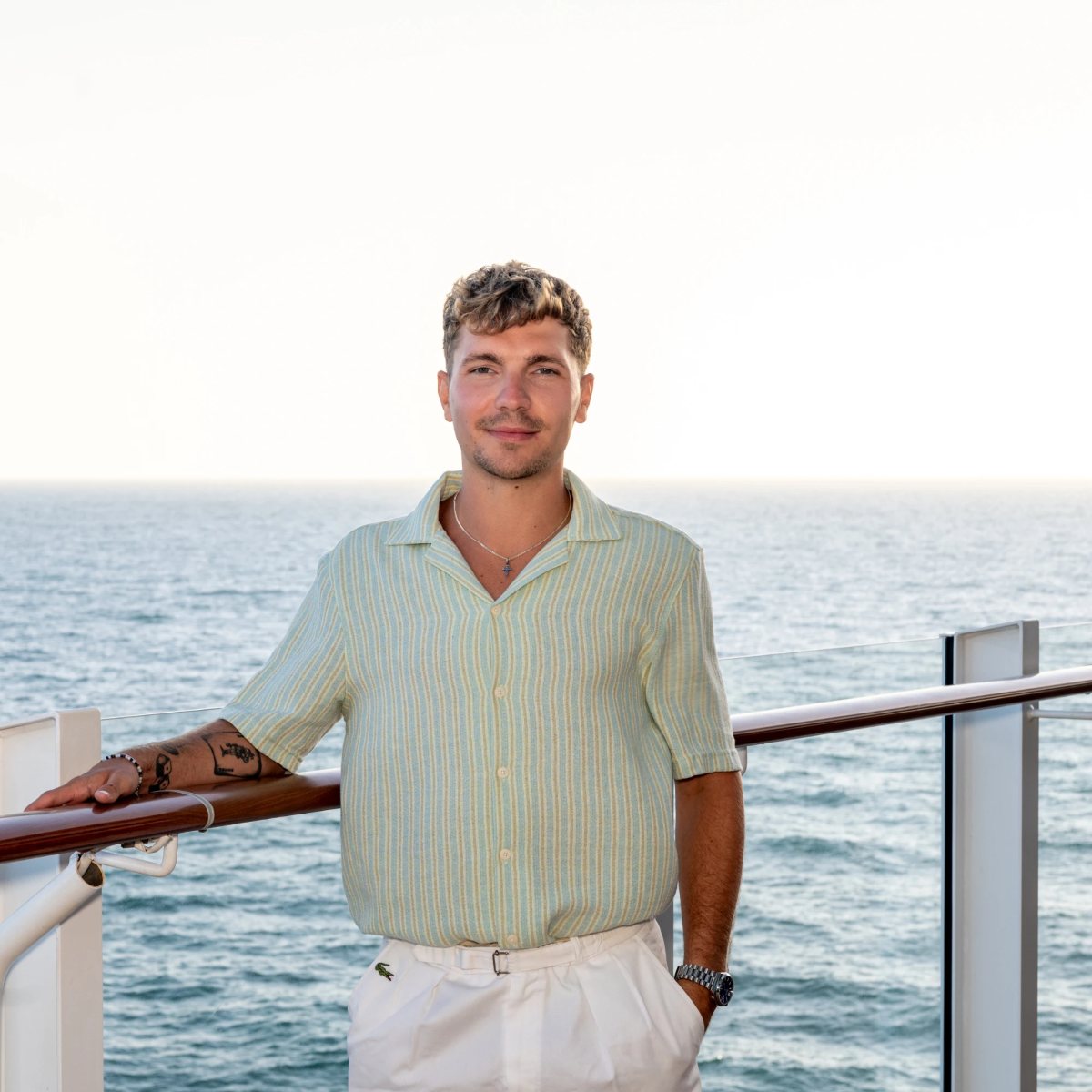Cameron, founder of Solent Web, standing by the sea